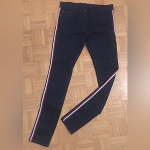 Women’s stretchy skinny jeans - dark blue with red and white stripes on the side